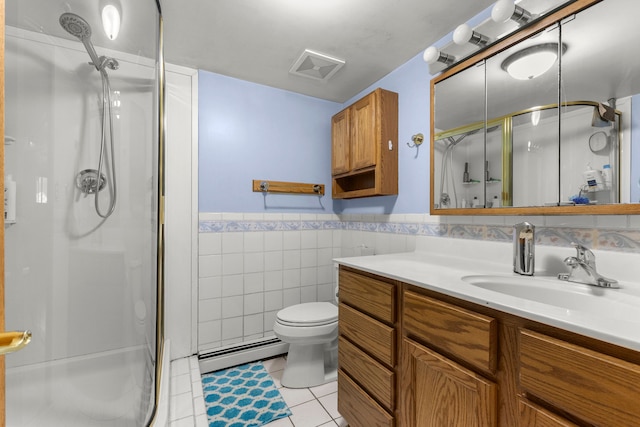 42891 Bemis Rd, Sumpter, MI 48111 - bathroom with vanity, tile patterned flooring, tile walls, a shower with door, and a baseboard radiator