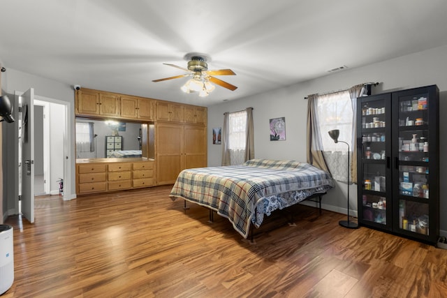 42891 Bemis Rd, Sumpter, MI 48111 - bedroom featuring ceiling fan and hardwood / wood-style floors