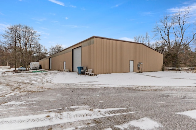 42891 Bemis Rd, Sumpter, MI 48111 - snow covered structure featuring a garage
