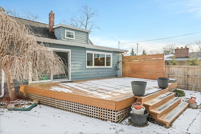 view of snow covered deck