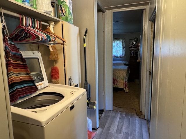 washroom with hardwood / wood-style floors