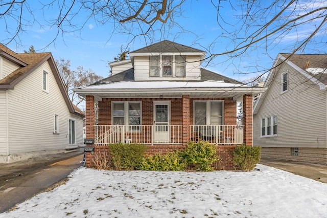 bungalow-style home with covered porch