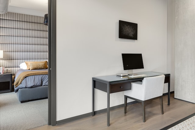 office space with light wood-type flooring