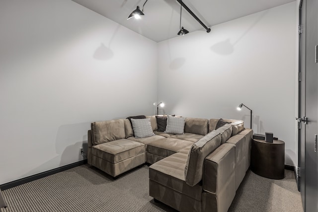 living room with beam ceiling and carpet