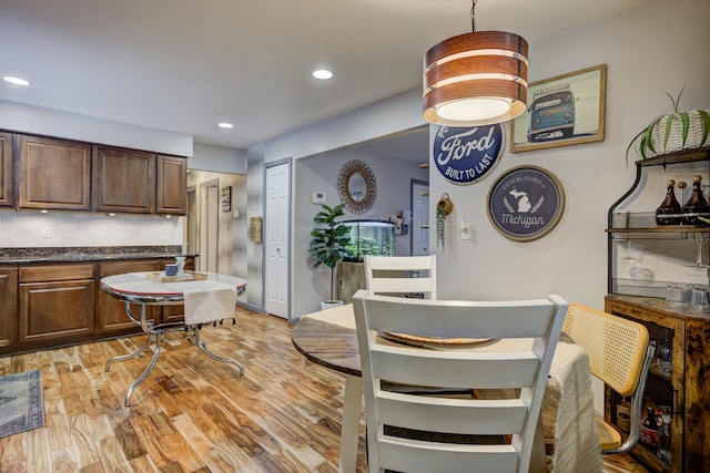 dining room featuring light hardwood / wood-style flooring