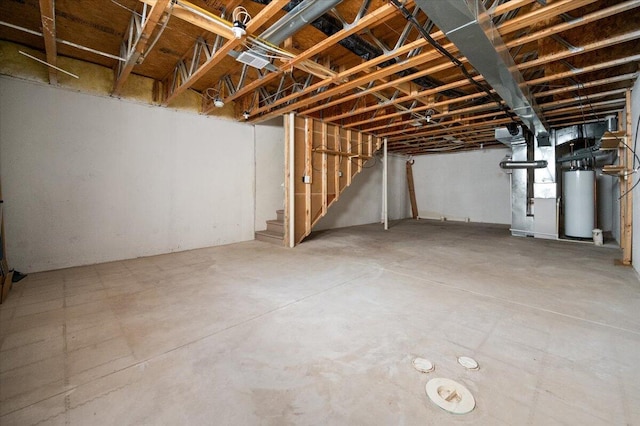 unfinished below grade area with water heater, stairway, and heating unit