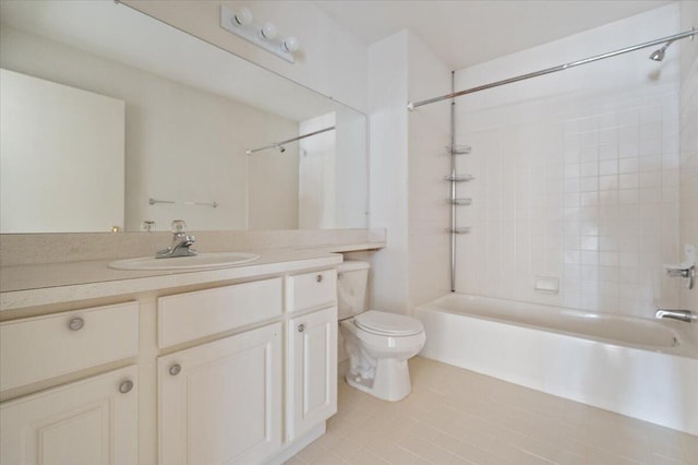 full bathroom with washtub / shower combination, tile patterned flooring, vanity, and toilet