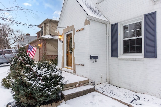 view of snow covered property