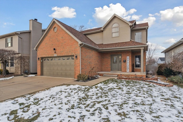 front of property with a porch and a garage