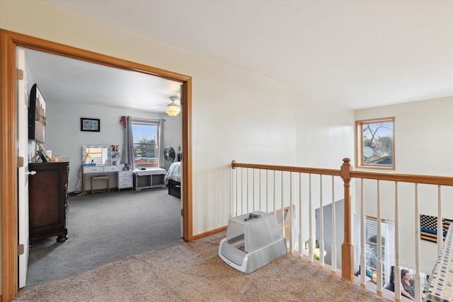 corridor featuring carpet flooring