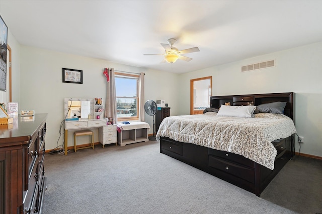 bedroom with ceiling fan and carpet