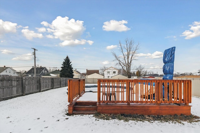 view of snow covered deck