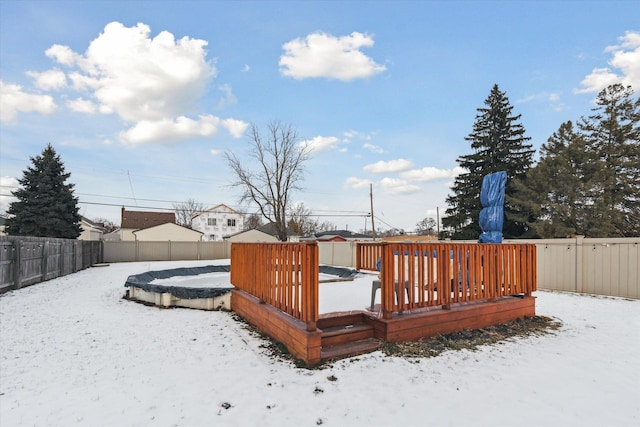 view of snow covered deck