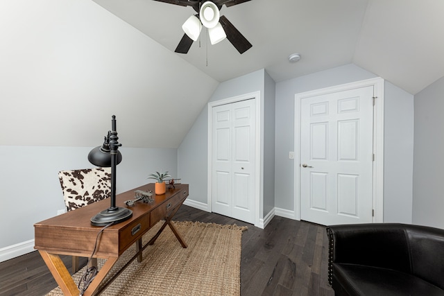 office space featuring lofted ceiling, ceiling fan, and dark wood-type flooring