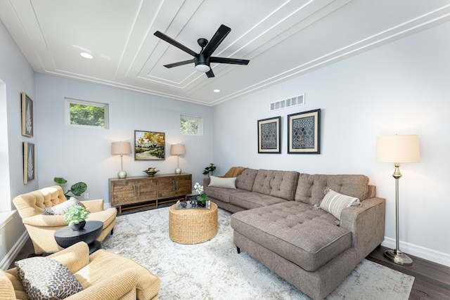 living room with ceiling fan and dark hardwood / wood-style floors