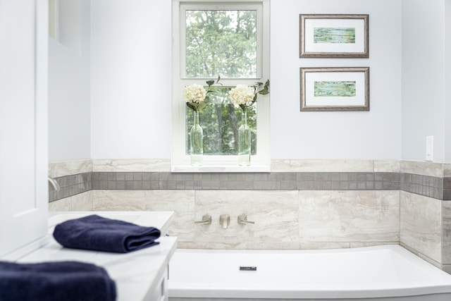 bathroom featuring a tub