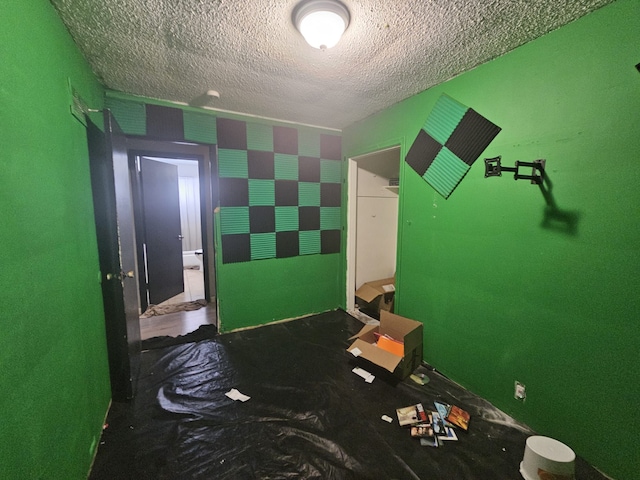 bedroom with a textured ceiling