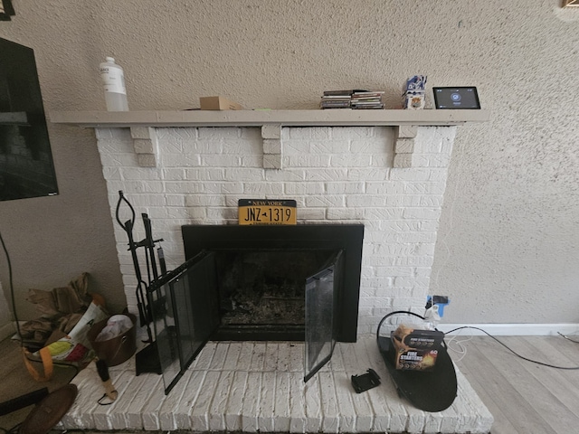 interior details featuring a fireplace