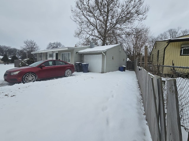 exterior space with a garage