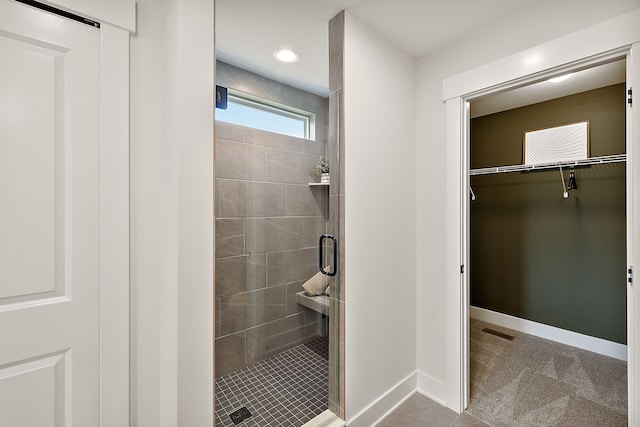 bathroom featuring an enclosed shower