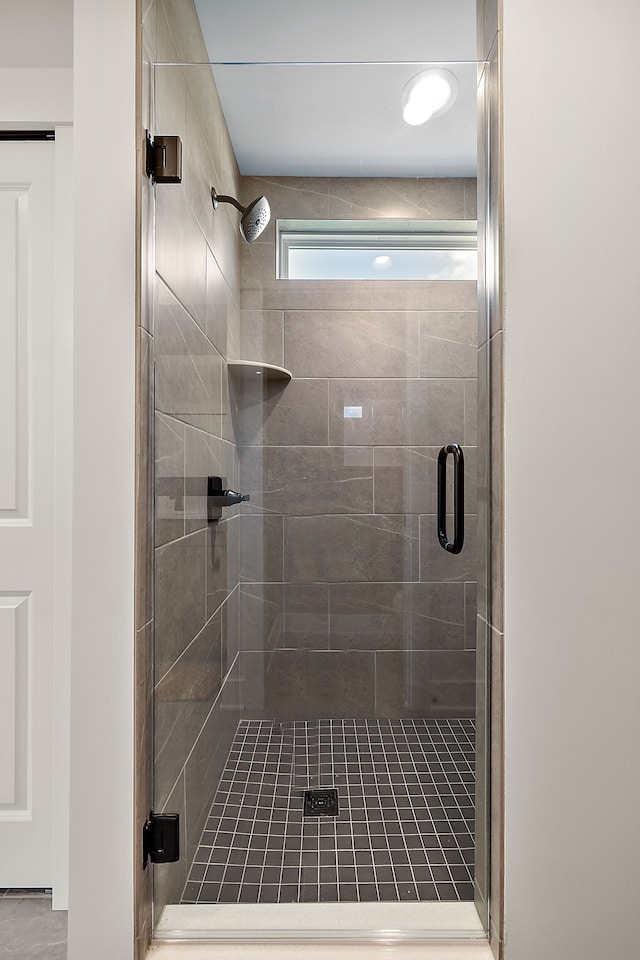 bathroom featuring walk in shower