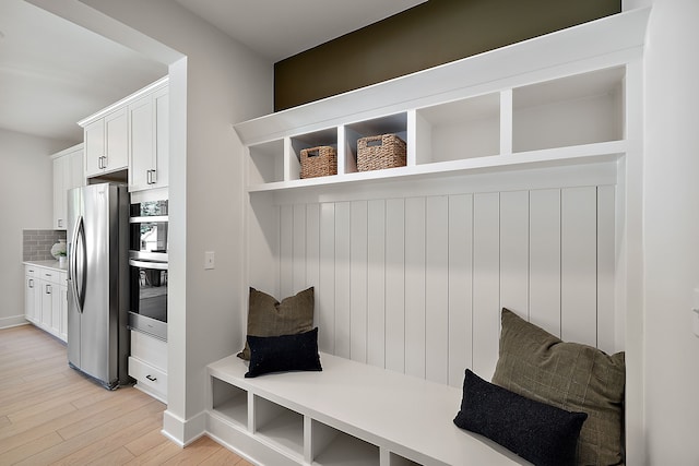 mudroom with light wood-type flooring