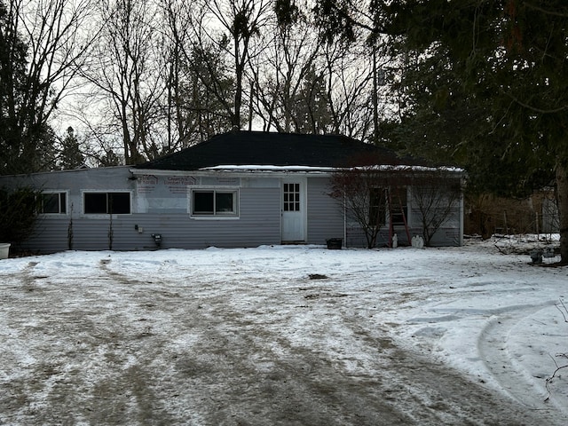 view of snow covered property