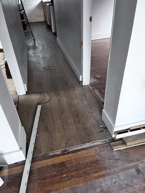 corridor featuring dark hardwood / wood-style floors