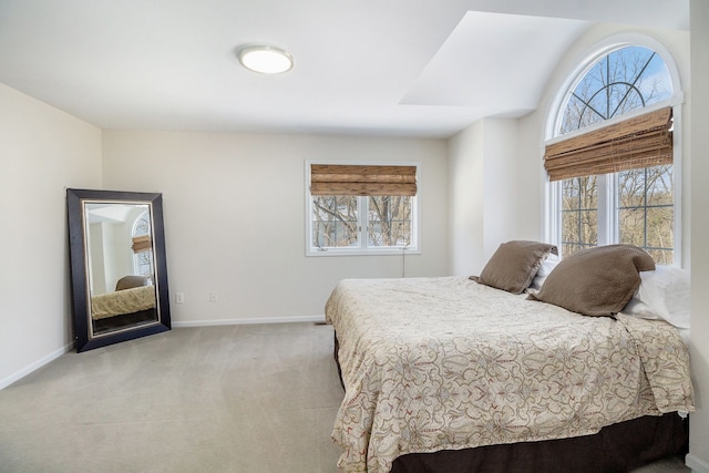 bedroom with light carpet