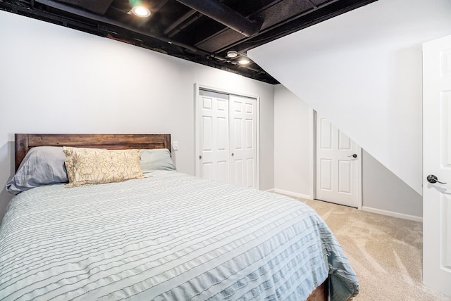 carpeted bedroom with a closet