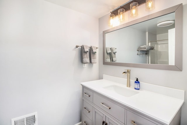 bathroom featuring vanity and walk in shower