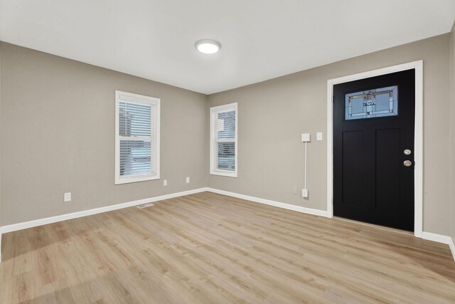 foyer entrance featuring light hardwood / wood-style floors