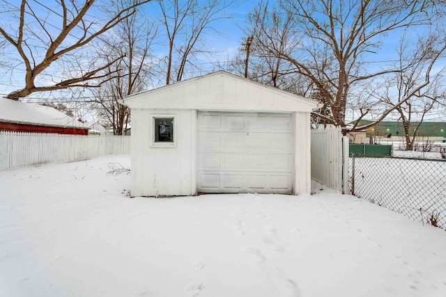 view of snow covered garage