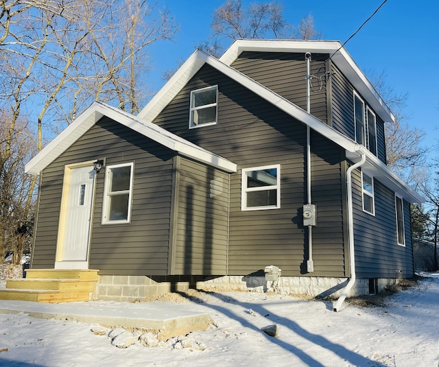 view of snow covered property