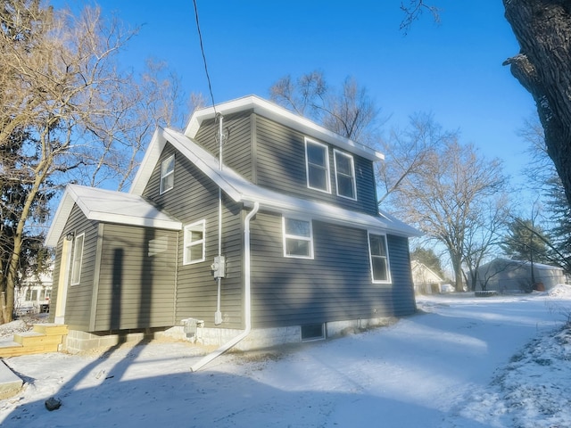 view of snow covered property