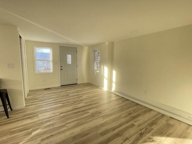 foyer entrance featuring light wood-type flooring