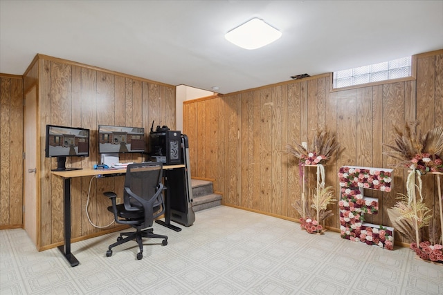 office space featuring wooden walls