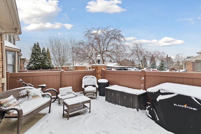 view of snow covered patio