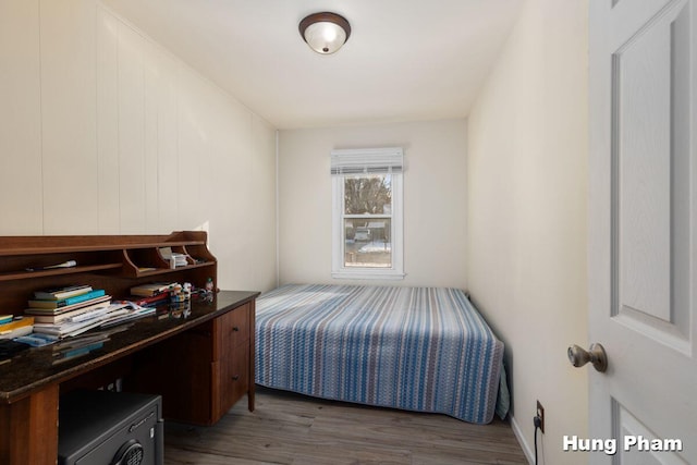 bedroom featuring dark hardwood / wood-style floors