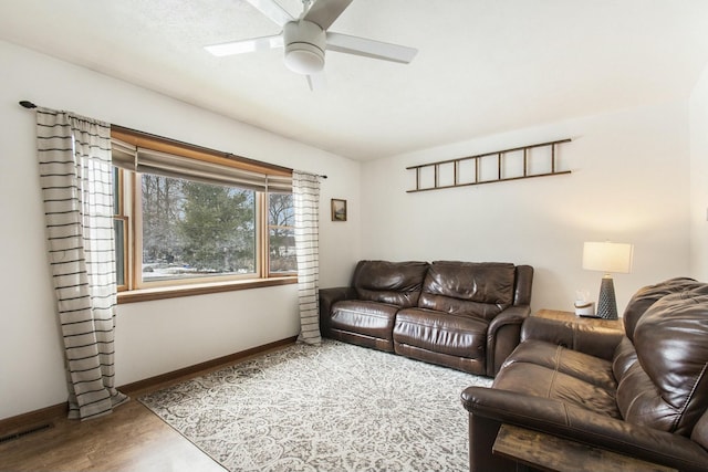 living room featuring ceiling fan