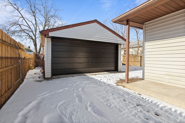 view of snow covered garage