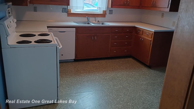 kitchen featuring white electric range oven, dishwasher, and sink