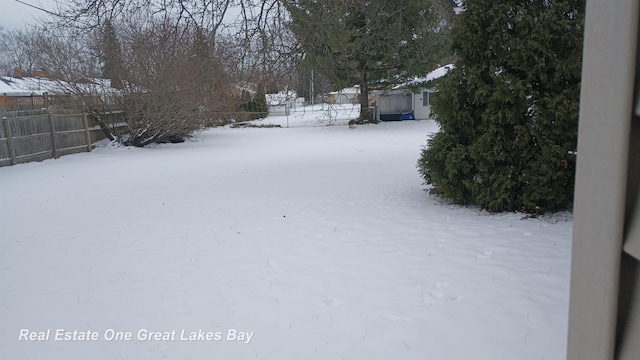 view of snowy yard