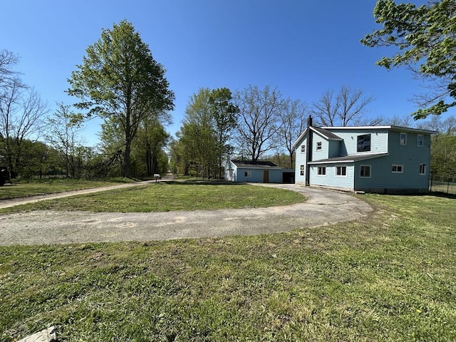 950 Herl Rd, Bronson, MI 49028 - view of green lawn with driveway