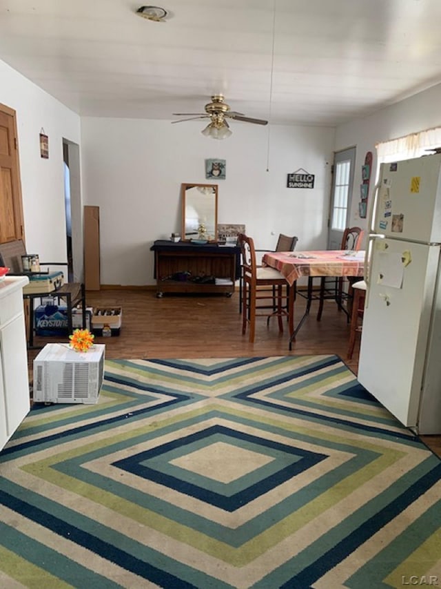 interior space featuring ceiling fan and hardwood / wood-style floors