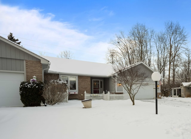 view of front of home with a garage