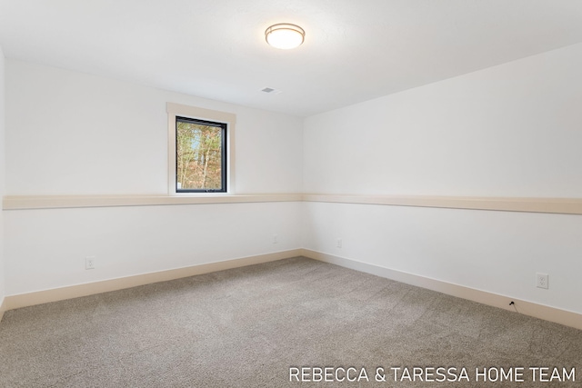 view of carpeted spare room