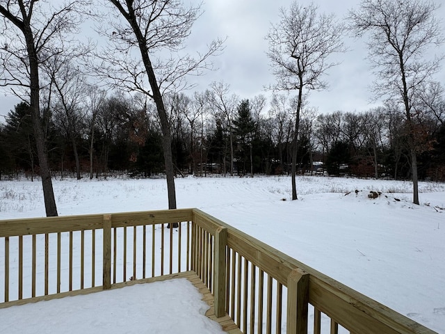 view of snow covered deck