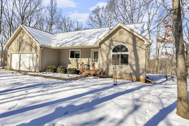 single story home with a garage