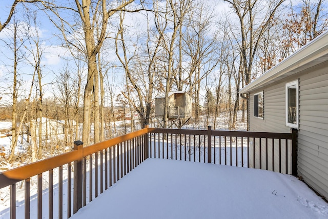 view of snow covered deck